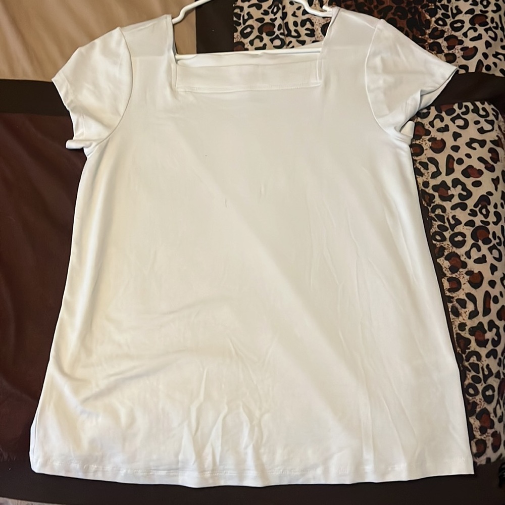 Size medium white shirt never worn